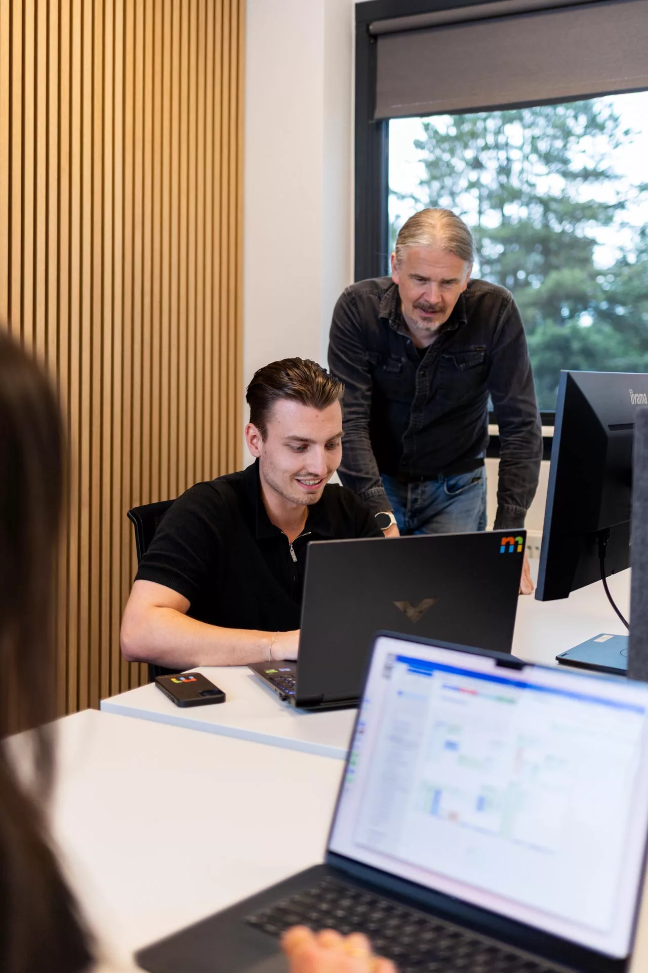 Dyon Grob en Richard Ludwig werken aan technische architectuur en low-code toepassingen bij Msquad